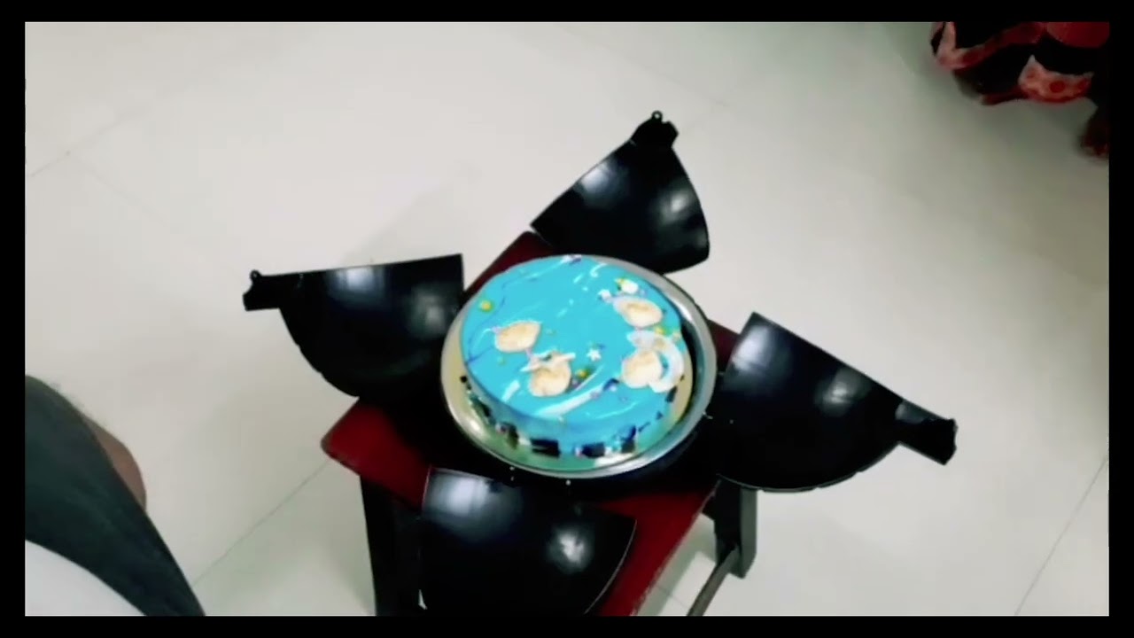 Mirror glaze bomb shell cake... By Homemade Baker's