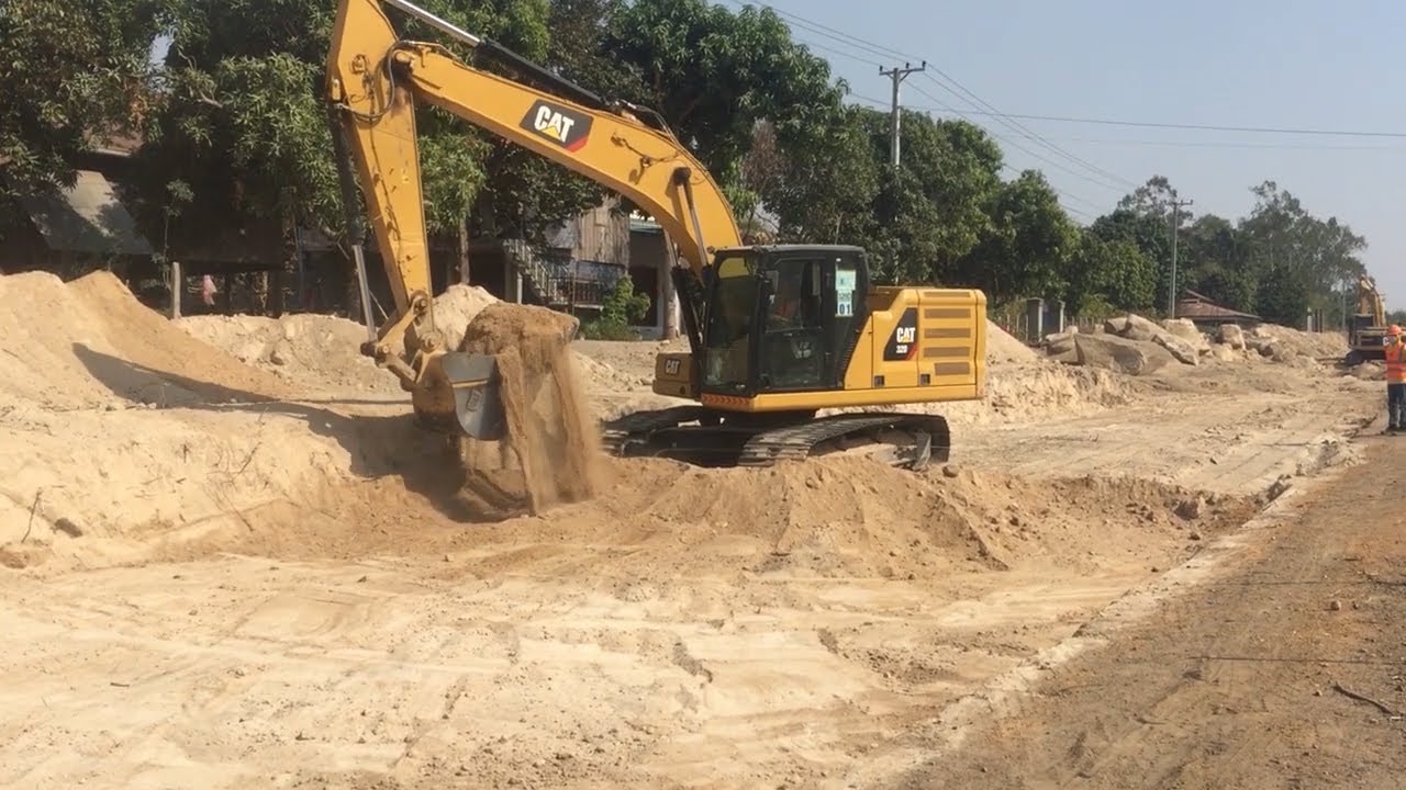 Awesome excavator working- Caterpillar 320 moving rock for road ...