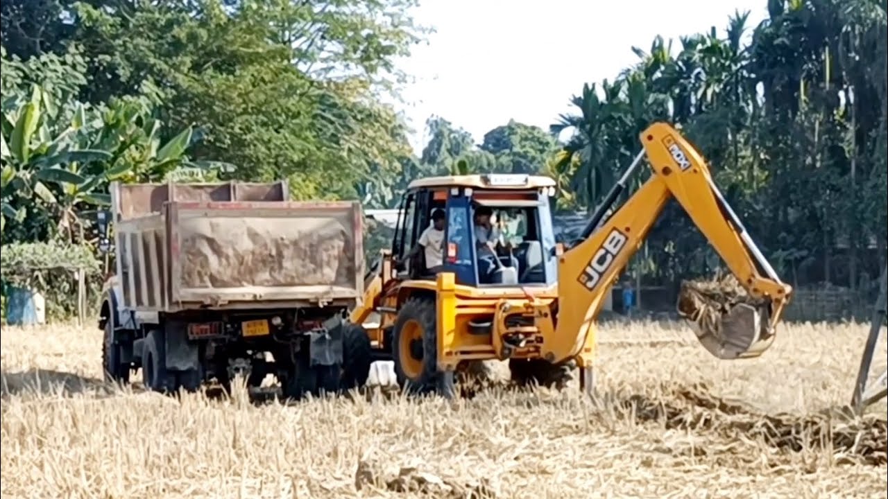 JCB 3DX machine dumper loading mode in video
