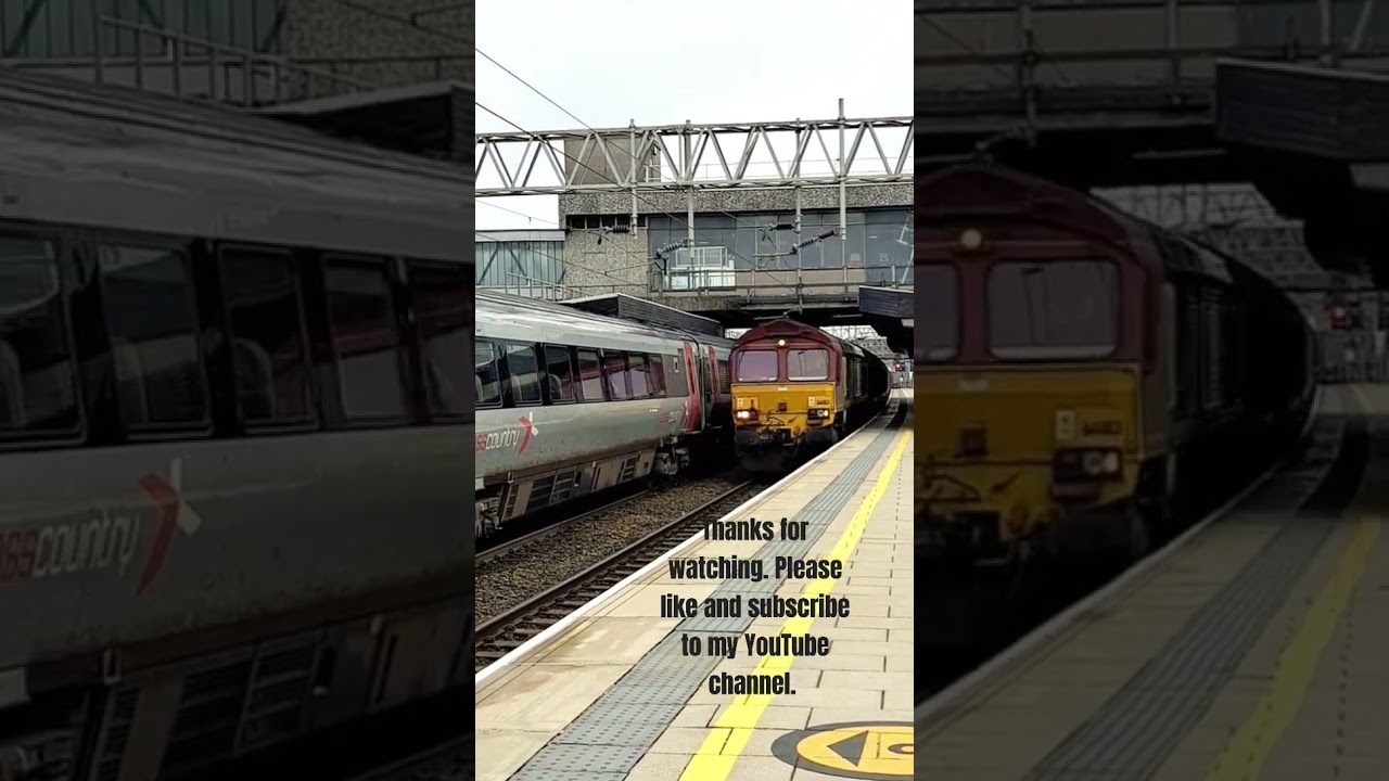 DB Cargo Class 66183 in EWS livery passes X Country Voyager at Stafford 