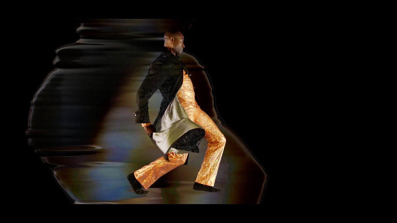 "Man in Overcoat  Fire Inside"