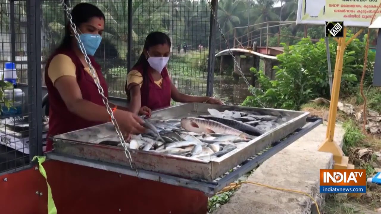 2 women running floating fish stall in Kerala's Kottayam