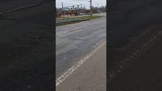Flood water rushing through the culverts at Logan's Landing. S. Airport Road is closed.