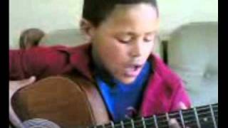 Video thumbnail of ""these arms won't let your heart break" South African coloured boy sings"