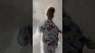 Guy Walks Into a Bubbling Garage While Holding Two Torches