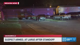 Jacksonville police search for armed suspect after standoff