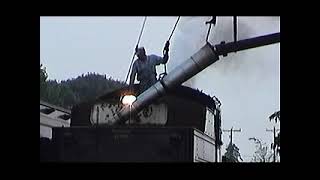 Strasburg #90 filling the tender with water from the tower