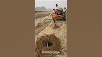 Automated Tree Planting: Tractor-Powered Hole Digger in Action!