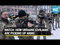 How Ukraine civilians are picking up arms to block Putin's troops; From Kyiv to Kharkiv