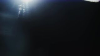 Abstract Bokeh Light Reflection of a Glass / Crystal, Defocused Shining Colorfully | Stock Footage