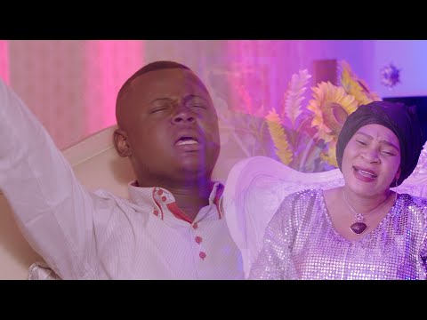 Jonathan Yafu Feat Maman L'or Mbongo ( Nzambe Ya Biyano) clip officiel