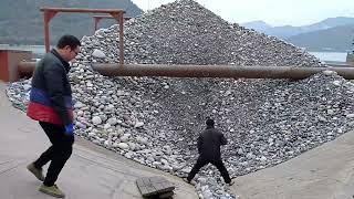 Barge unloading 5000 tons of gravels. Relaxing video