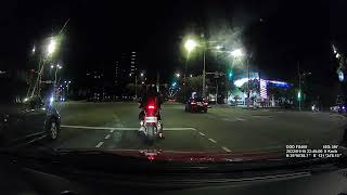 白牌重機騎在堤頂大道快車道等左轉