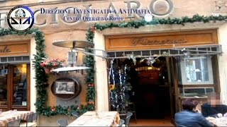 توقيف 11 فرداً من مافيا "ندرانغيتا" screenshot 4