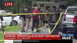 Source: Officer killed in fugitive hunt in Alexandria