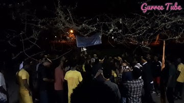 CSE celebrating GC cup trophy at Anfi in front of the shops|