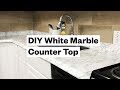 Transform your kitchen for $20 - DIY White Marble Countertop