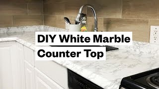 Transform your kitchen for $20  DIY White Marble Countertop