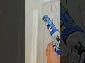 Caulk applied neatly along wall seam