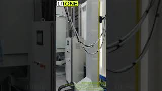 Automatic powder spray booth in operation