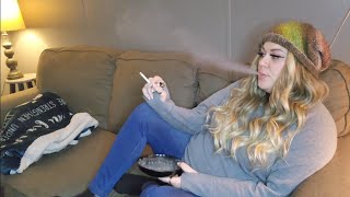 Blonde girl smoking and relaxing