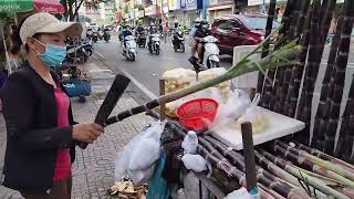 Hard Working Women Selling Fresh Sugarcane Pieces