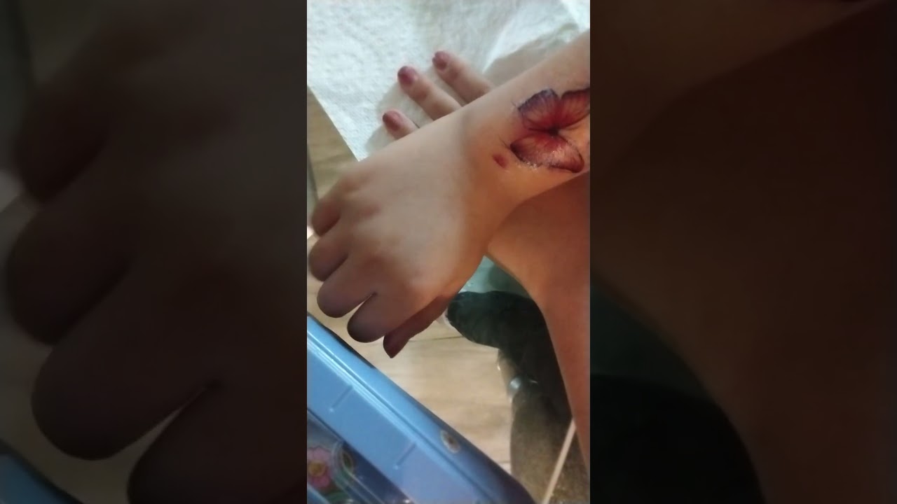 Putting a tattoo on my arm!