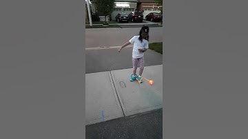 Learning how to play skip ball.