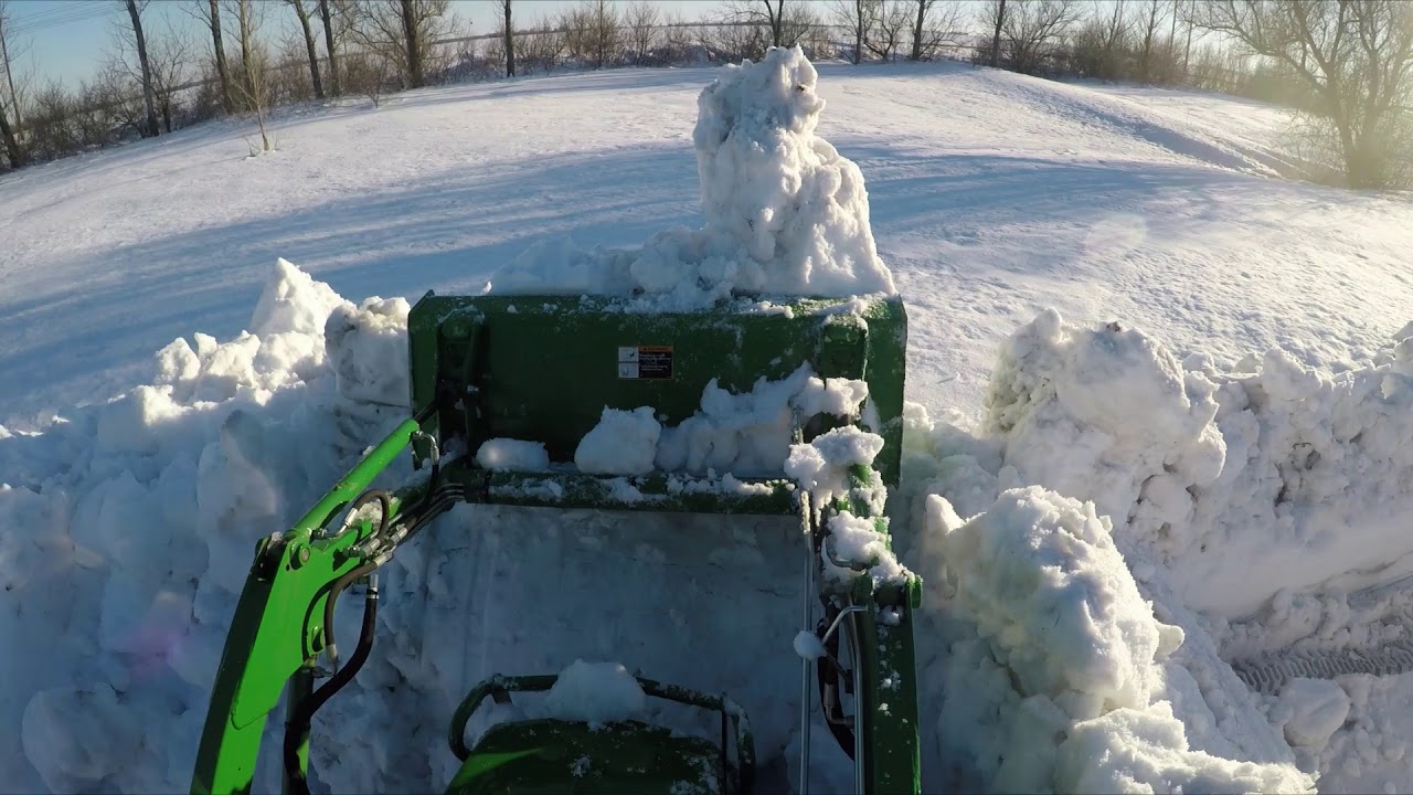 JOHN DEERE 1025R LOADER WORK YouTube