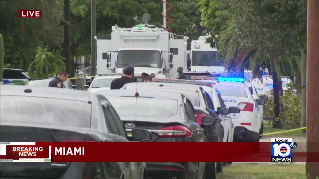 Officers swarm Miami neighborhood after police shooting - YouTube