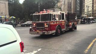 FDNY ENGINE 23 RESPONDING WITH HEAVY AIR HORN USAGE ON COLUMBUS CIRCLE ON WEST SIDE OF MANHATTAN.