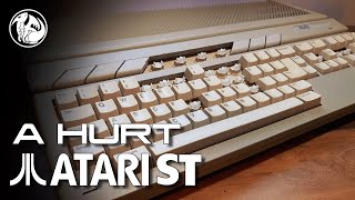 Famous Atari 1040 STF - Hurtin', and yet surprisingly working! Wealth