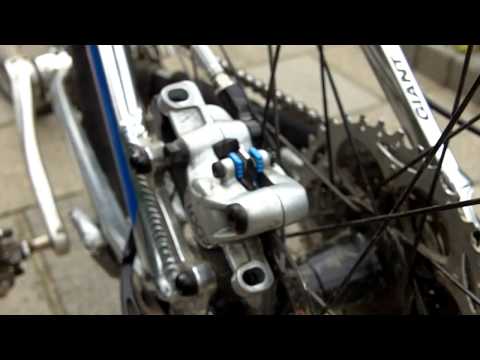 How to align a disc brake caliper?
