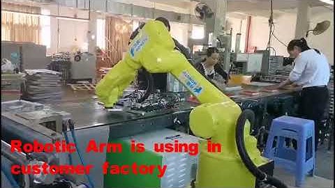 Yewllow robot arm for box making line