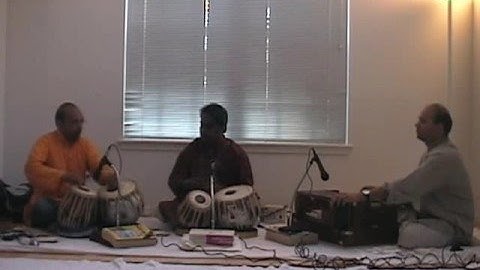 Pandit Samar Saha with student