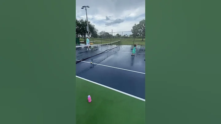 3 year old aura hitting a forehand.