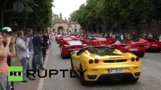 Some hundred ferrari cars could be seen driving through the streets of
fulda in germany on saturday to mark this year's annual esperanto
meeting. vid...