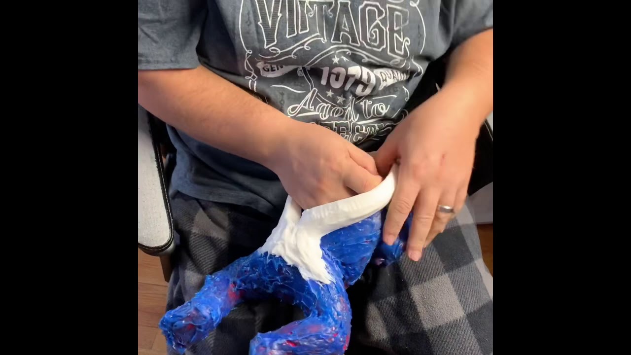 Pulling a silicone baby from her mold!