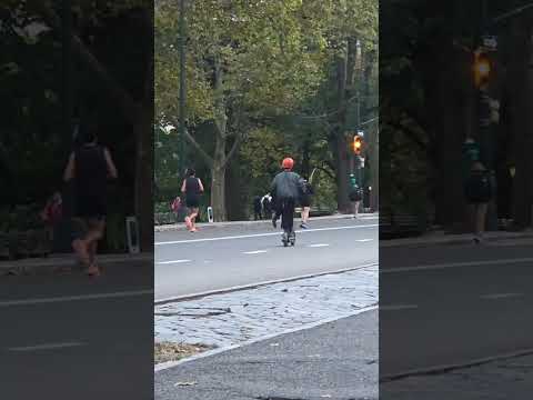 Chabad Rabbi runs along-side a runner to have him shake the Lulav & Etrog on Sukkot