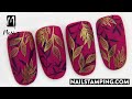 Elegant nail art with golden stamping patterns (nailstamping.com)