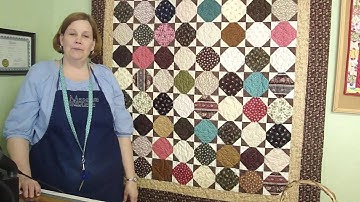 Make an Amalie Snowball Quilt Using Charm Squares