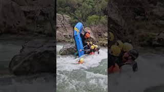 Whitewater Rafters Bump Into a Rock