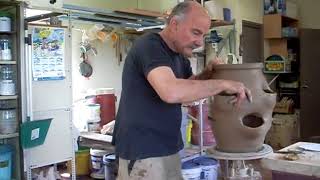 Terracotta Strawberry Pot. Cutting out and forming the pockets.