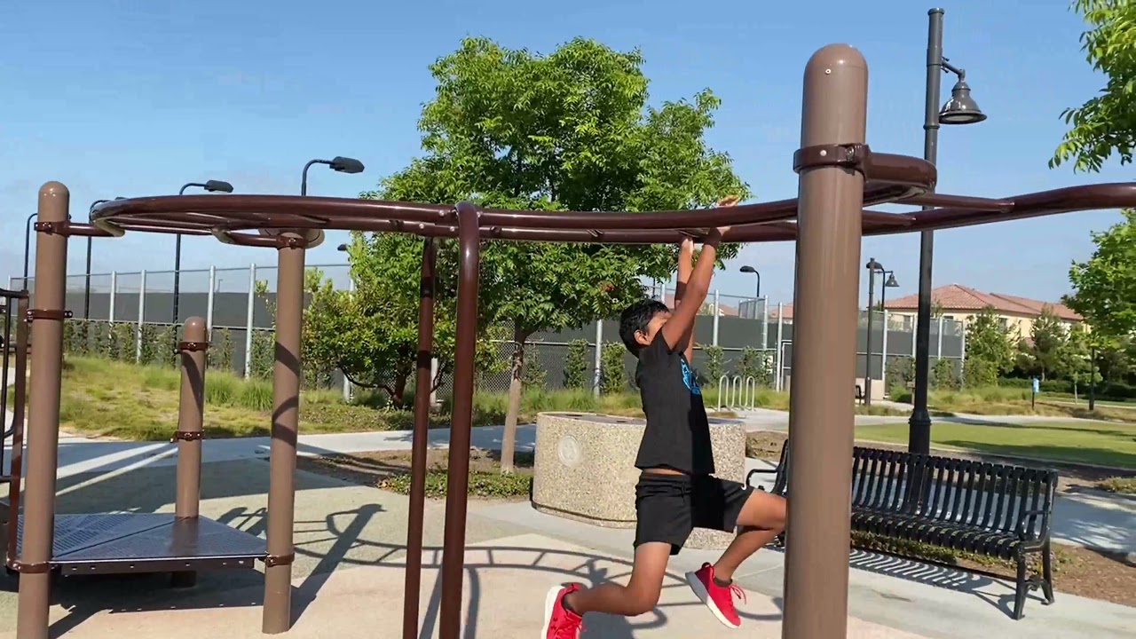 Monkey bar challenge at park
