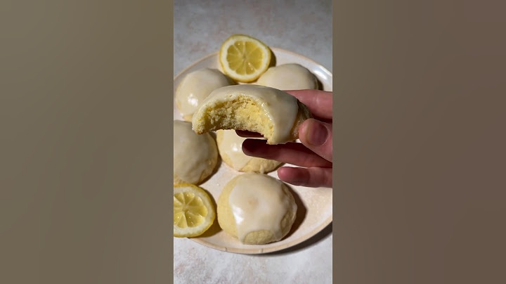 italian style melt-in-your-mouth lemon cookies topped with a lemon glaze #baking #lemon