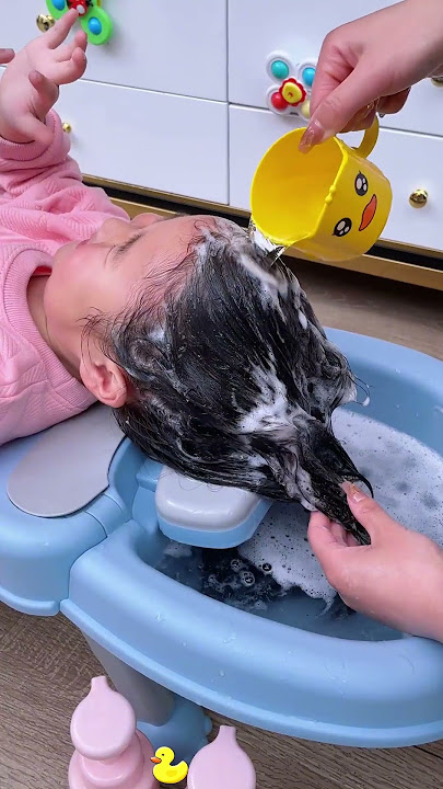 Struggling to Wash Your Girl's Hair? Try the Foldable Baby Shampoo Chair! #babycare #parentingtips