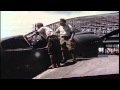 Japanese soldiers look into cockpit of captured American Curtiss P-40 fighter pla...HD Stock Footage