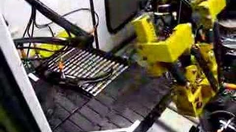 1062-8 Automatic Deburr & Wash System at the Robot