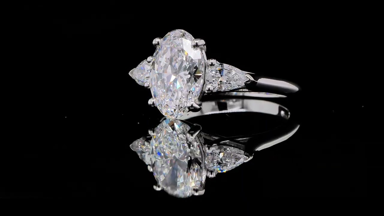 2.00 Carat Oval Lab Grown Three Stone Ring In 18K White Gold Pear Sides - Orogem Jewelers