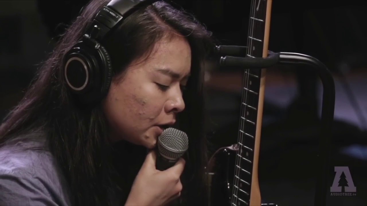 Mitski yelling into guitars YouTube
